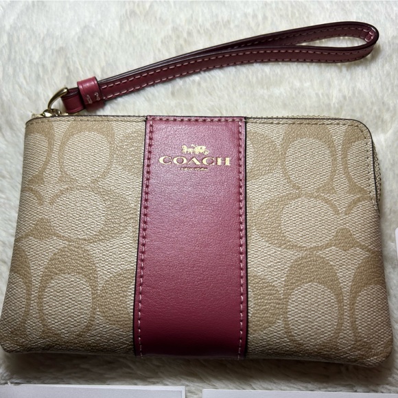 Coach Handbags - COACH / Corner Zip Wristlet / Light Khaki Coated Canvas w/Rouge Vertically Strip